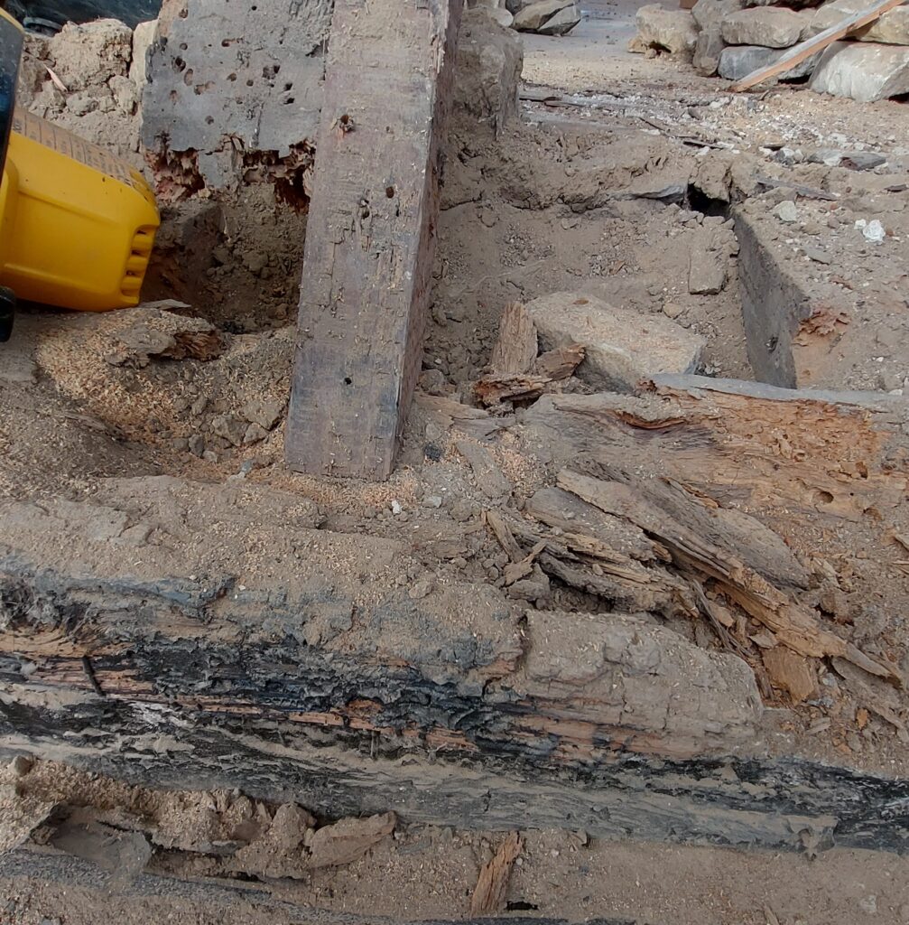 Rotten roof timbers, damaged by death watch beatles